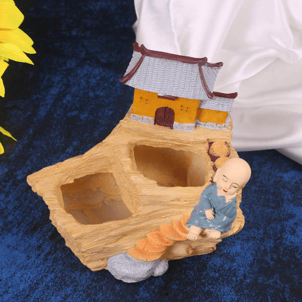 polyresin monk house planter top view