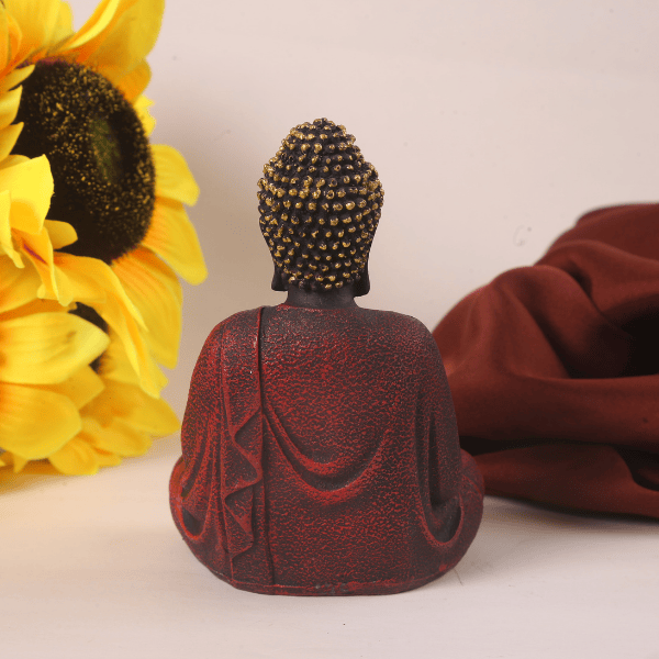 red texture meditating buddha back view