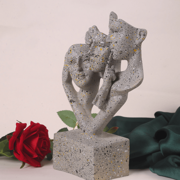 unique handicraft 3 faced sculpture side view