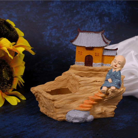 polyresin monk house planter front view