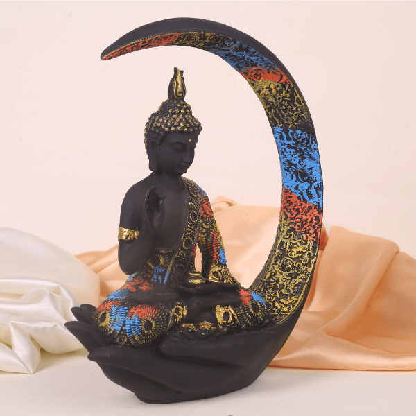 multicolour moon meditating buddha side view