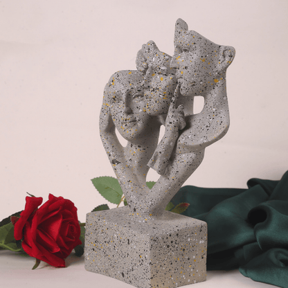 unique handicraft 3 faced sculpture side view